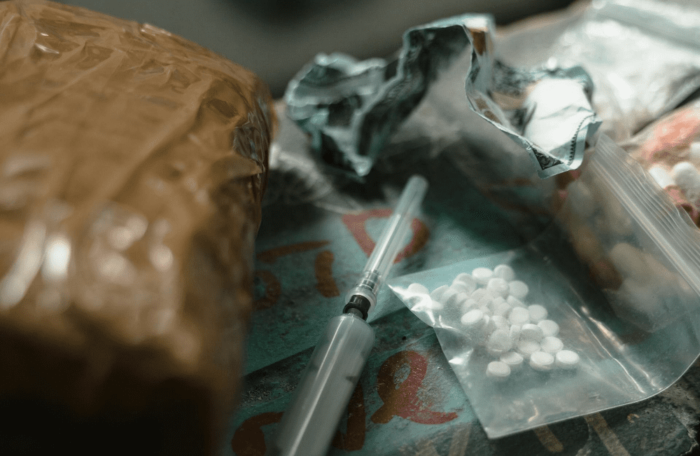 Drugs and a syringe.